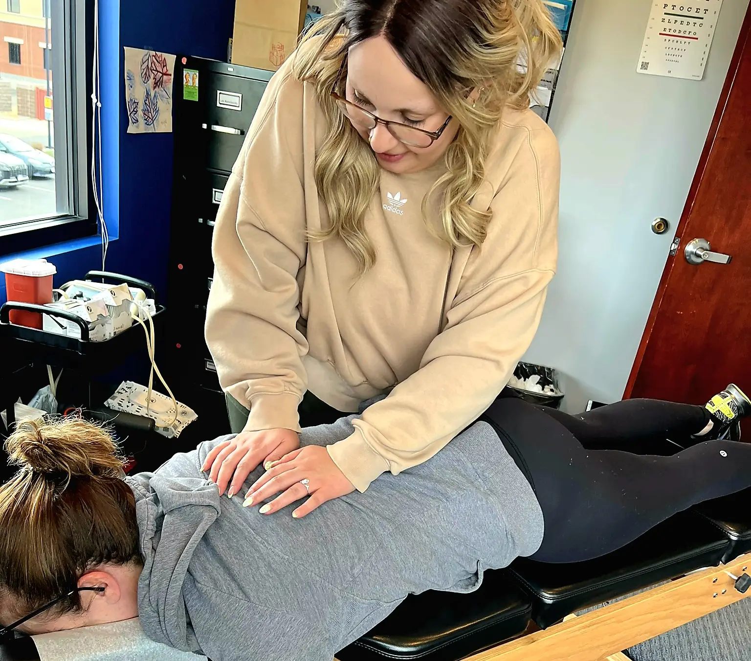 Chiropractor Firestone CO Alyssa Quimby With Patient Chiropractor Firestone CO Alyssa Quimby With Patient
